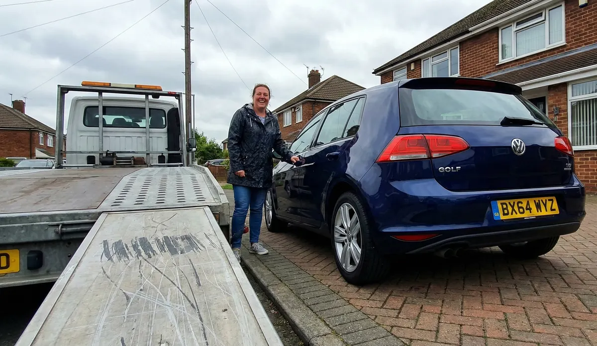 Emma F.'s car on delivery day